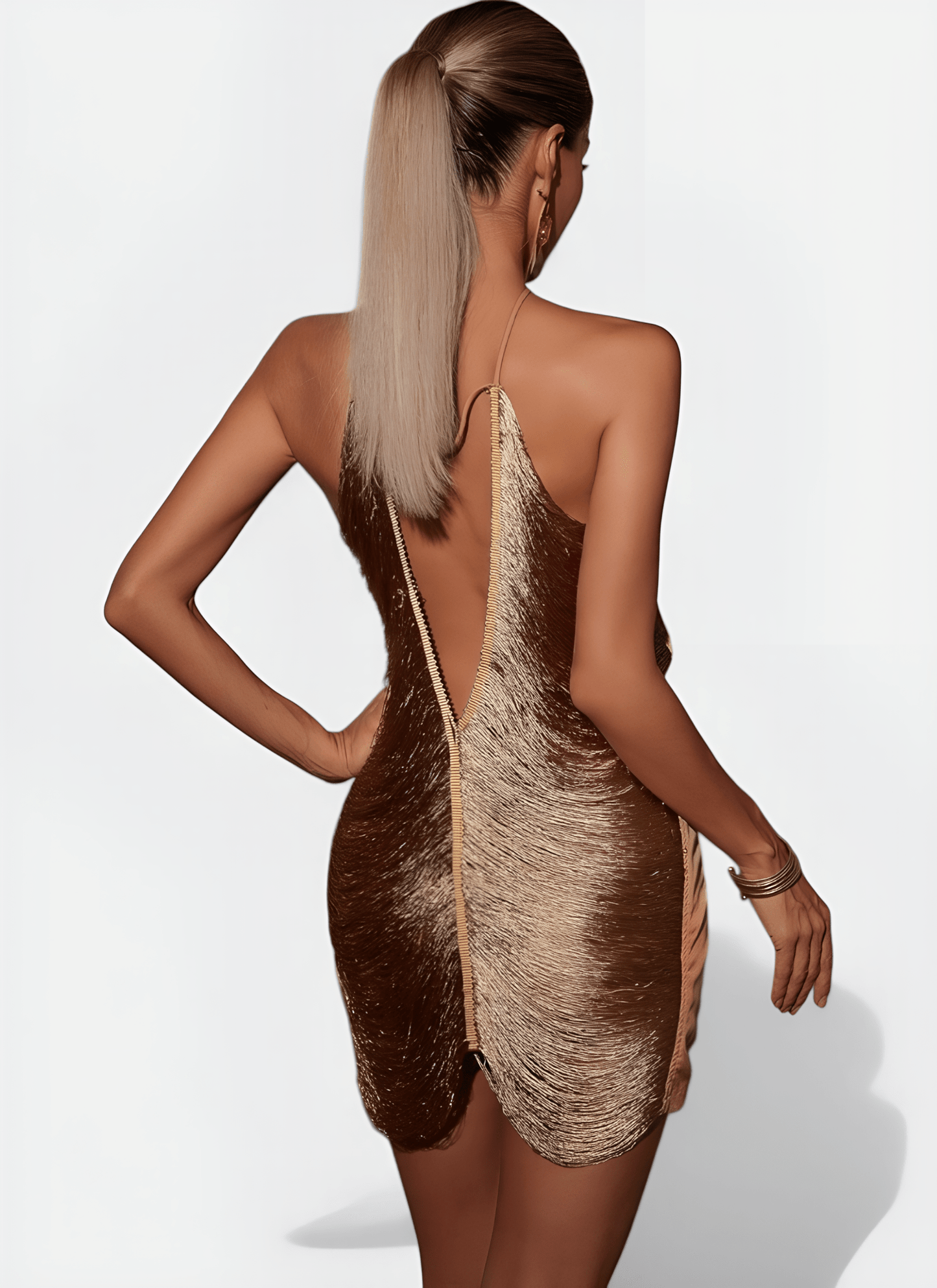 ELISE HALTER TASSEL MINI DRESS - Cecilia`s Dresses